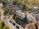 Aerial view of house in neighborhood surrounded by mature trees at 1181 Cleburne Ne Ave, Atlanta, GA 30307