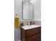 Beautifully appointed half bath with a sleek vanity and stylish mirror at 1181 Cleburne Ne Ave, Atlanta, GA 30307