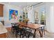 Dining room with statement light fixture and views to the outdoor deck at 1181 Cleburne Ne Ave, Atlanta, GA 30307
