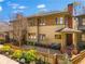 Charming exterior view of a home featuring a brick chimney, fenced yard, and inviting front porch at 1181 Cleburne Ne Ave, Atlanta, GA 30307
