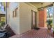 Charming front porch with brick flooring and access to the front door at 1181 Cleburne Ne Ave, Atlanta, GA 30307
