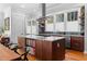 Bright kitchen with a large island, stainless steel hood, and stylish bar stools at 1181 Cleburne Ne Ave, Atlanta, GA 30307
