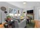 Bright living room features a fireplace, comfortable seating, and large windows at 1181 Cleburne Ne Ave, Atlanta, GA 30307