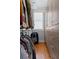 Organized walk-in closet featuring custom shelving, ample hanging space, and hardwood floors at 1181 Cleburne Ne Ave, Atlanta, GA 30307