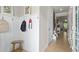 Functional entryway with board and batten detail, hooks, and a clear view of the home interior at 138 Bryon Ln, Acworth, GA 30102