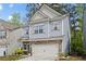 Inviting two-story home with a classic design, a two-car garage, and well-maintained landscaping at 138 Bryon Ln, Acworth, GA 30102
