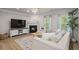 Bright living room with a fireplace, natural light, and stylish décor at 138 Bryon Ln, Acworth, GA 30102