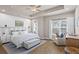Spacious main bedroom with tray ceilings, natural light, and stylish decor, creating a relaxing retreat at 138 Bryon Ln, Acworth, GA 30102