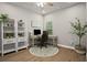 Comfortable office space with natural light, a desk, and shelving, ideal for working from home at 138 Bryon Ln, Acworth, GA 30102