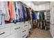 Organized walk-in closet with custom shelving, drawers, and ample hanging space for clothing and accessories at 138 Bryon Ln, Acworth, GA 30102
