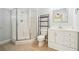 Updated bathroom with walk-in shower, tile flooring, modern vanity, and elegant fixtures at 255 Helens Manor Dr, Lawrenceville, GA 30045