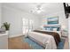 Bright bedroom with large bed, side tables, and french doors, creating a tranquil and inviting atmosphere at 255 Helens Manor Dr, Lawrenceville, GA 30045