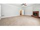 Large bedroom includes a brick fireplace and an ensuite bathroom, offering comfort and convenience at 255 Helens Manor Dr, Lawrenceville, GA 30045