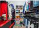 Walk-in closet with ample storage including shelves, rods, and space for organizing clothes and shoes at 255 Helens Manor Dr, Lawrenceville, GA 30045