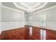 Formal dining room with hardwood floors, a chandelier, and plenty of natural light at 255 Helens Manor Dr, Lawrenceville, GA 30045