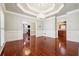 Elegant dining room with hardwood floors and classic wainscoting at 255 Helens Manor Dr, Lawrenceville, GA 30045