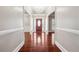 Inviting entryway with hardwood floors and a chandelier at 255 Helens Manor Dr, Lawrenceville, GA 30045