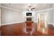 Open living room with a brick fireplace and modern ceiling fan at 255 Helens Manor Dr, Lawrenceville, GA 30045