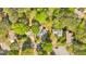 An aerial view of neighborhood showcasing beautiful homes and tree-lined streets at 30 Sweetwood Ct, Roswell, GA 30076