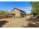 Large, fenced backyard featuring a well-maintained lawn and ample space for entertaining and recreation at 4015 Two Bridge Ct, Buford, GA 30518