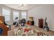 Versatile bonus room with exercise equipment, neutral paint, and a large rug at 4015 Two Bridge Ct, Buford, GA 30518