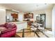 Open-concept kitchen featuring stainless steel appliances, a large island, and a breakfast nook with seating at 6884 Barker Station Walk, Sugar Hill, GA 30518