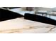 A beautiful stone countertop with intricate natural patterns, perfect for food preparation or entertaining at 1690 Cotswold Ne Dr, Brookhaven, GA 30319