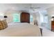 Bright bedroom features a large window, wood shutter, and a cozy window seat at 2167 W Wesley Nw Rd, Atlanta, GA 30327