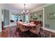 Traditional dining room with an area rug and a view of window seat at 2167 W Wesley Nw Rd, Atlanta, GA 30327
