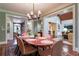 Bright dining room with views to different areas of the home through archways at 2167 W Wesley Nw Rd, Atlanta, GA 30327