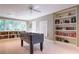 Game room featuring a foosball table, recessed lighting, and built-in bookshelves at 2167 W Wesley Nw Rd, Atlanta, GA 30327