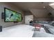 Comfortable home theater with projector screen, surround sound, and plush seating at 2167 W Wesley Nw Rd, Atlanta, GA 30327