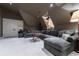 Spacious home theater featuring a large sectional sofa, projector and storage at 2167 W Wesley Nw Rd, Atlanta, GA 30327