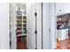 Pantry with white shelving is ideal for food storage and supplies at 2167 W Wesley Nw Rd, Atlanta, GA 30327