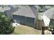 Aerial view of home's backyard, complete with a patio and plenty of green space at 550 Breton Highlands, Fairburn, GA 30213