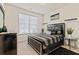 Bedroom with black furniture, plush bedding, and a window at 550 Breton Highlands, Fairburn, GA 30213