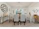 Formal dining room featuring decorative accents, pendant lighting, and neutral tones at 550 Breton Highlands, Fairburn, GA 30213