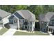 Aerial view of a beautiful two-story home with well-maintained lawn and complementing landscape at 550 Breton Highlands, Fairburn, GA 30213