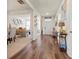 Inviting foyer boasts wood floors, white trim, and open access to dining and living areas at 550 Breton Highlands, Fairburn, GA 30213