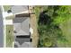 Aerial view showcasing the home's well-maintained backyard and mature trees at 550 Breton Highlands, Fairburn, GA 30213