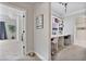 Hallway featuring a built-in desk, shelving, and views of the bedroom at 1622 Bunting Forest Ct, Marietta, GA 30064