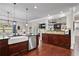 Modern kitchen with stainless steel dishwasher and fixtures and granite countertops at 1622 Bunting Forest Ct, Marietta, GA 30064