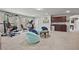 Versatile recreation room with exercise equipment, a seating area, and a wet bar at 1622 Bunting Forest Ct, Marietta, GA 30064