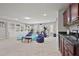 Bright recreation room offering space for exercise, lounging, and a convenient wet bar at 1622 Bunting Forest Ct, Marietta, GA 30064