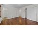 Spacious bedroom features wood floors, closet, neutral walls, and access to a connecting bath at 2000 Hill Rd, Marietta, GA 30062
