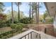 Charming home with a meticulously landscaped front yard and elegant black railing at 2000 Hill Rd, Marietta, GA 30062