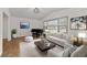 Stylish living room with ample seating, a piano, and a large window, perfect for Gathering gatherings and entertainment at 2000 Hill Rd, Marietta, GA 30062