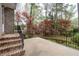 Charming outdoor patio with brick accents and black railing, offering a cozy spot for relaxation at 2000 Hill Rd, Marietta, GA 30062