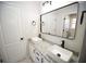 Elegant bathroom with dual sinks and granite countertop at 2328 New Haven Pl, Conyers, GA 30094