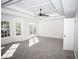 Bright bedroom with bay windows and tray ceiling at 2328 New Haven Pl, Conyers, GA 30094